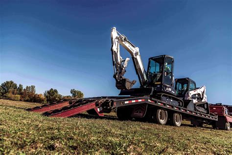 ram 5500 towing bobcat and mini excavator|How to Tow a Bobcat Skid.